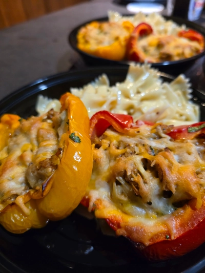 Stuffed bell peppers with melted cheese and pasta — a folate- and B-vitamin-rich meal supporting the methylation cycle